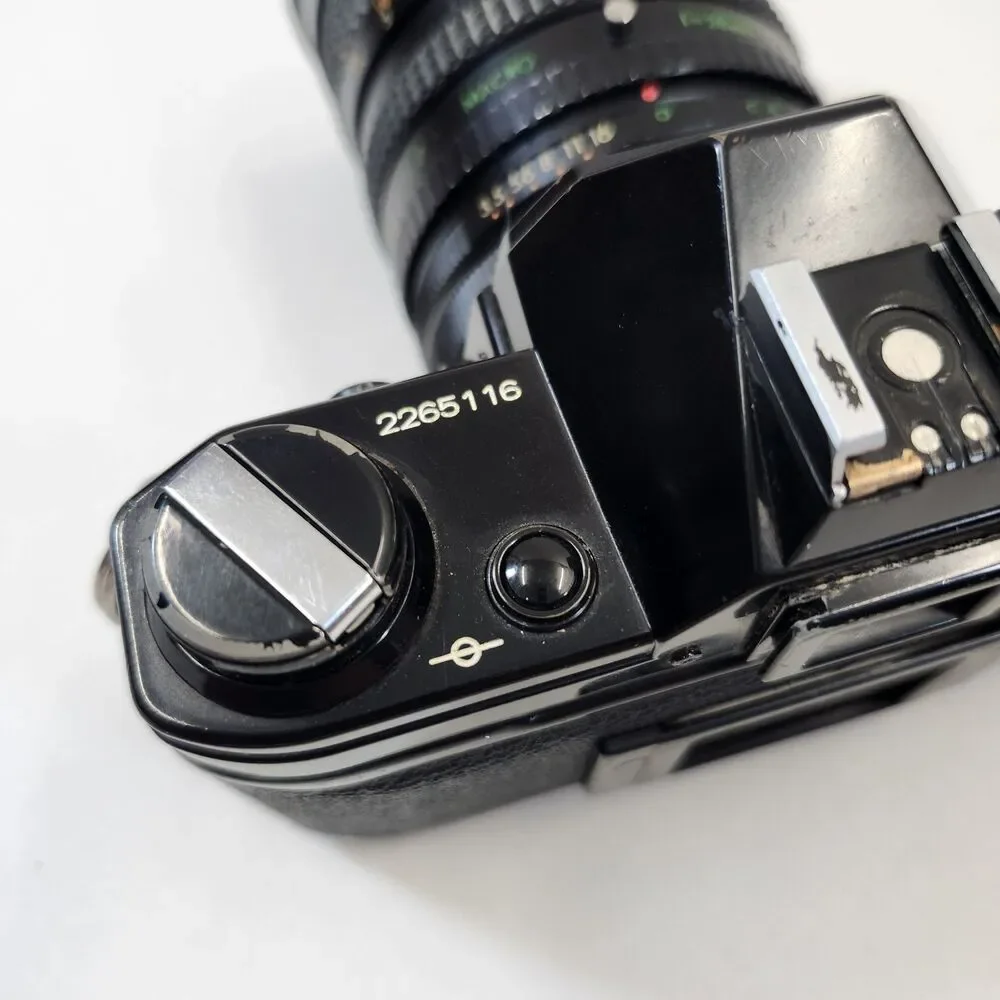 Canon AE-1 Black 35mm SLR Film Camera Sakar MC Zoom 1:3.5-4.5 f 28-80mm